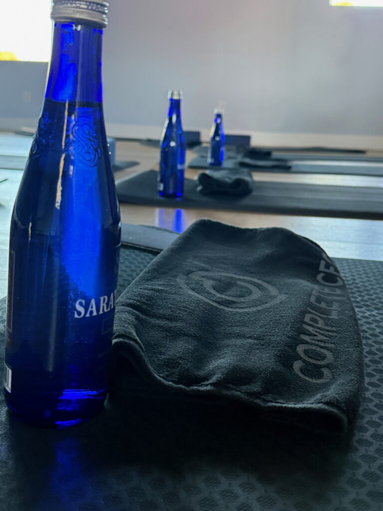Water bottle, mat, and Complete CEO towel set out for a whole-person CEO peer group immersive day in Phoenix